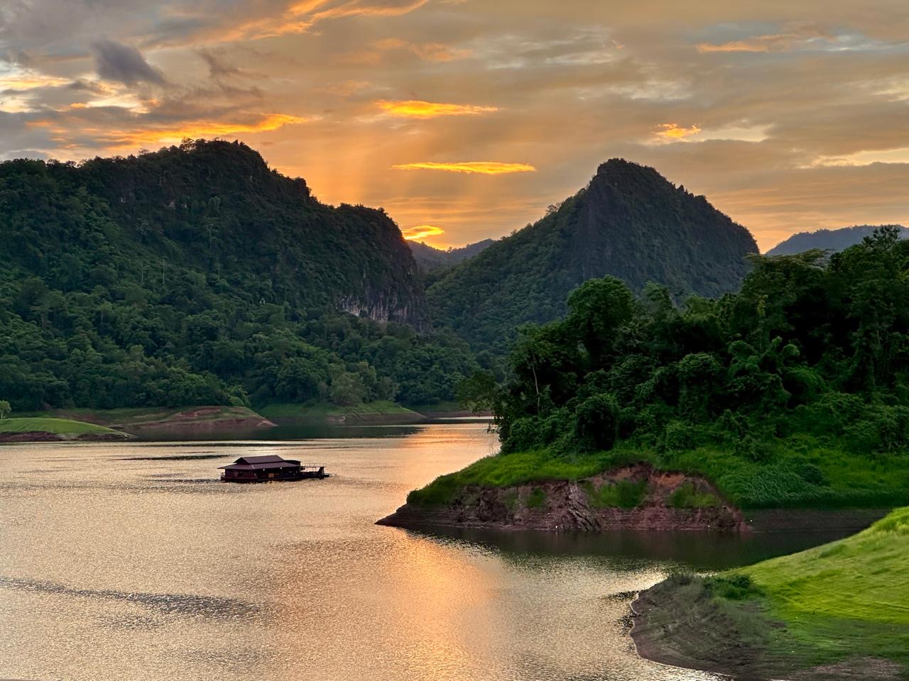 Sunset over mountains and a river valley